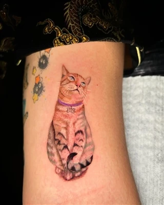 Tattoos als Tribute: Tierhalter ehren pelzige Freunde mit winziger Tinte